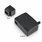 Size comparison of the compact new N64 Pow USB-C adapter beside the large original Nintendo 64 power brick, labelled New and Original