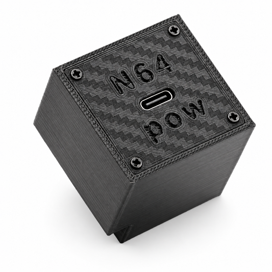 Black 3D printed N64 Pow USB-C power supply for the Nintendo 64, top view showing the carbon-fibre textured panel, embossed N64 POW logo and central USB-C port