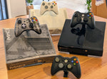Xbox 360 Original, 360 S and 360 E display stands side by side, with the separate Xbox 360 controller stand